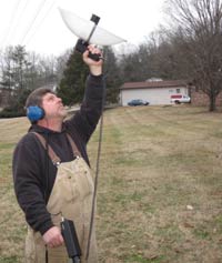 Kenny Atkison using parabolic ultrasonic microphone to locate arcing